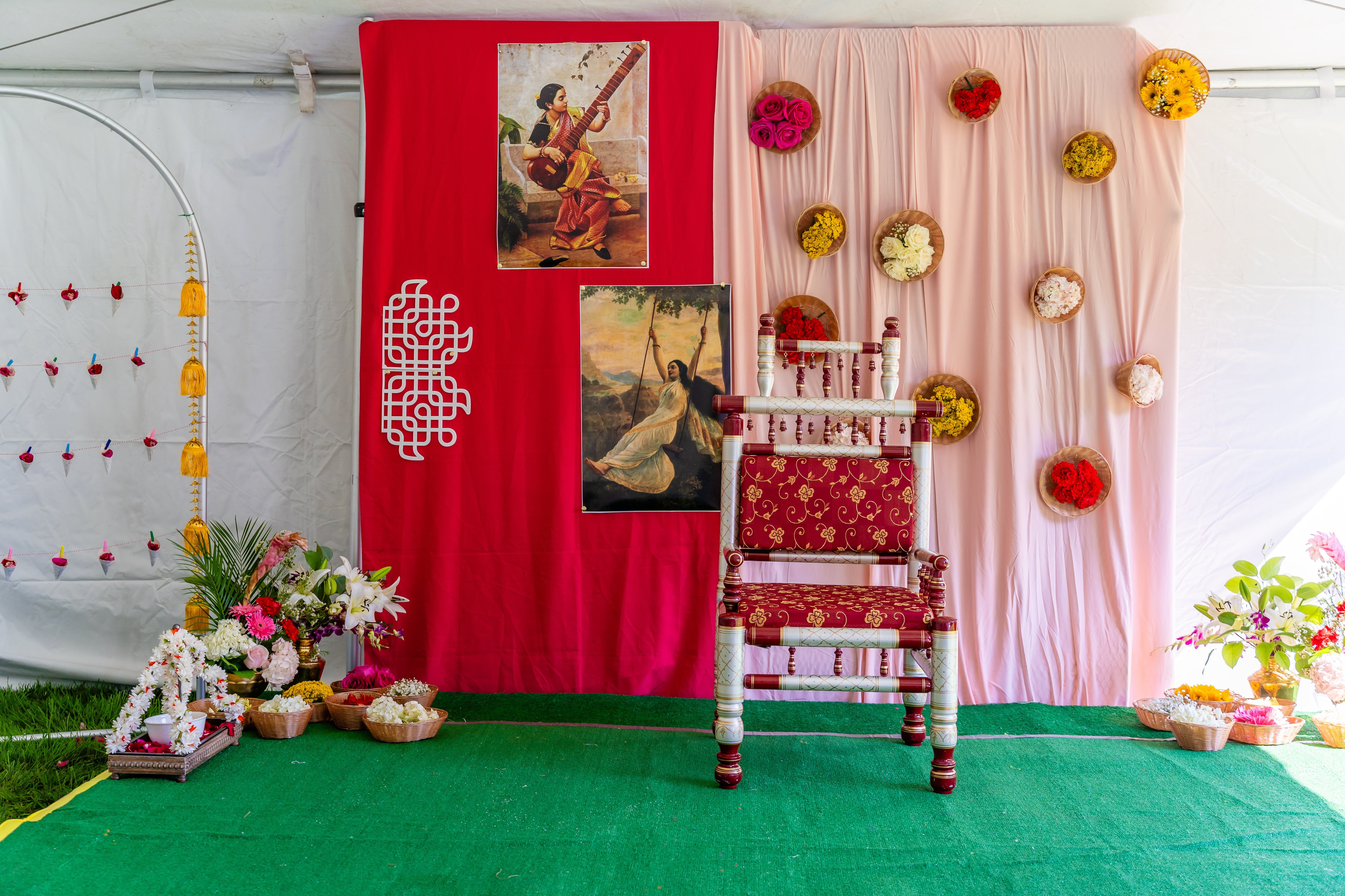 Intimate Haldi ceremony yellow floral decoration details